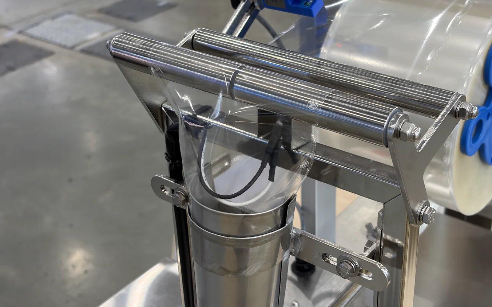 PH-2AS film forming and three-side sealing mechanism